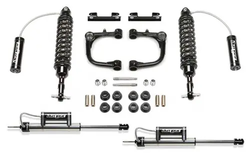 Fabtech 2016-2023 Toyota Tacoma 2WD/4WD 3in UCA System w/DL 2.5 Resi Coilovers & Rear DL Resi Shocks Limited Offer